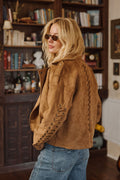 Cognac jacket with refined detailing and a flattering silhouette.