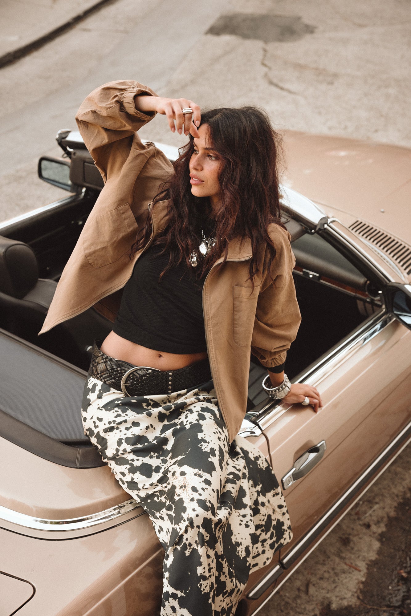 Lifestyle shot of the maxi skirt styled for day-to-night versatility.