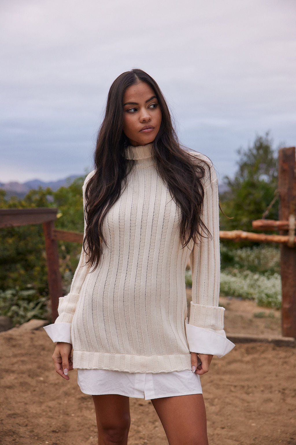 Allison White Long Sleeve Knit Mini Dress paired with complementary accessories for a polished look.