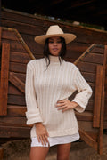 White knit mini dress with knit accents, a white sequin dress essential.