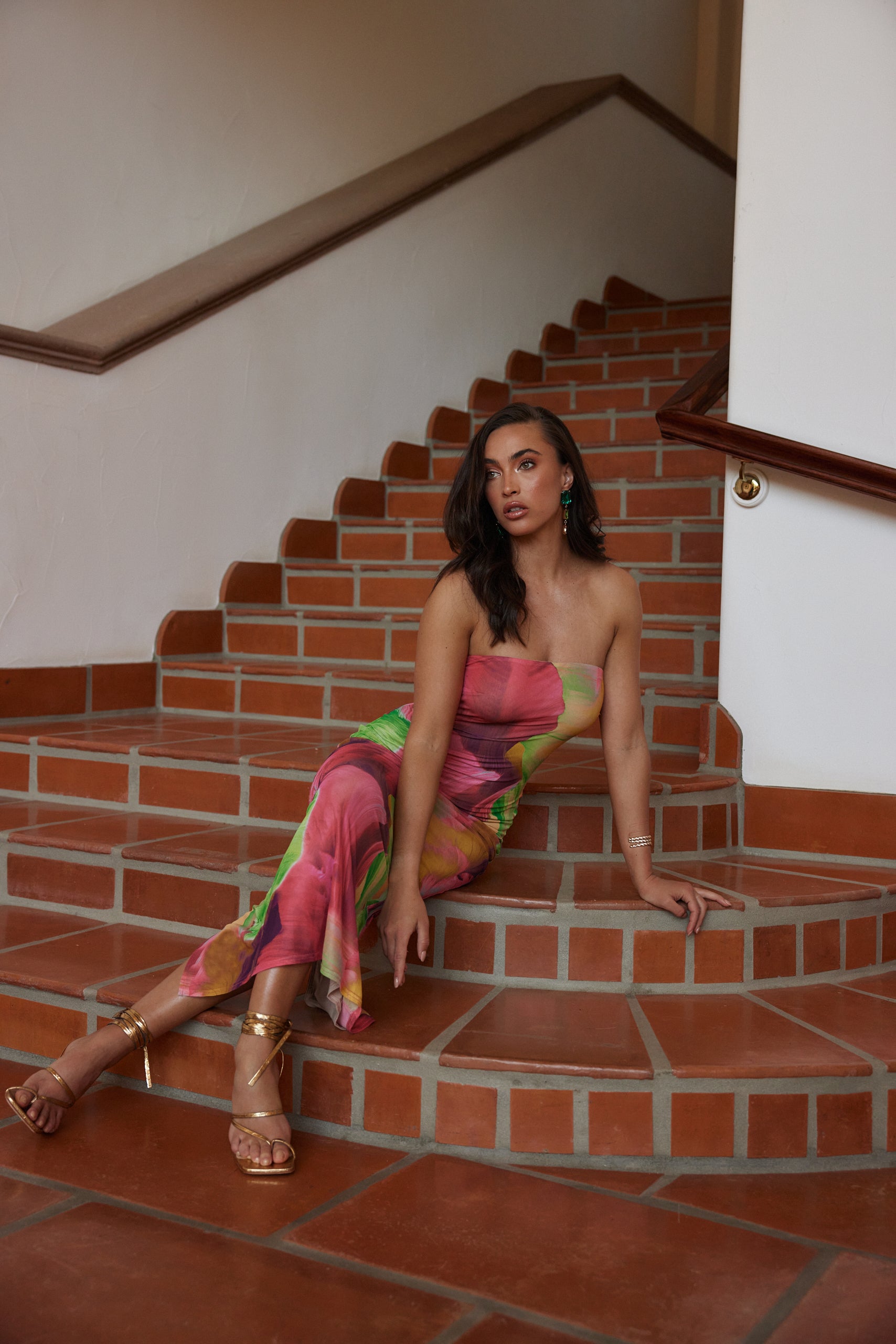 Avani Multi Strapless Maxi Dress paired with complementary accessories for a polished look.