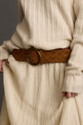 Brown belt with refined detailing and a flattering silhouette.