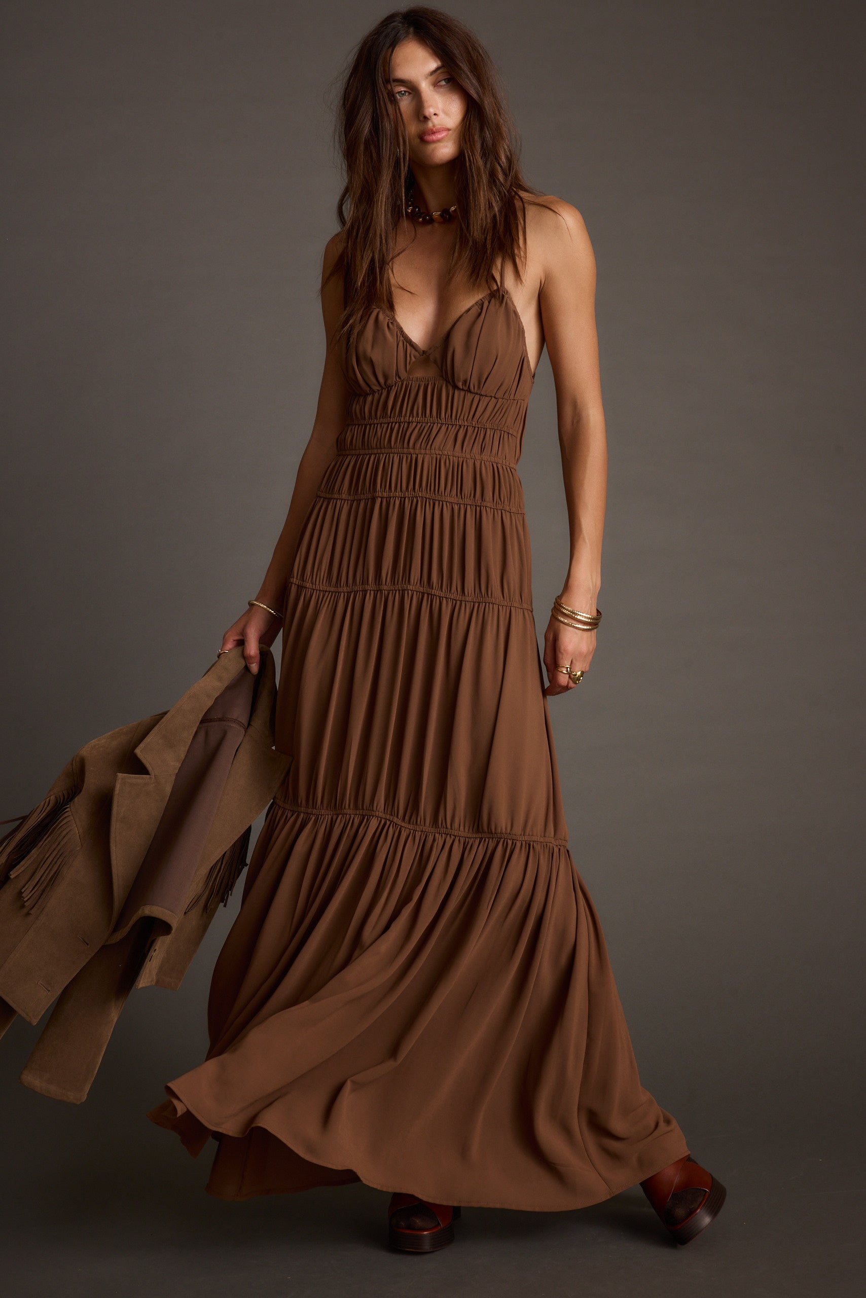 Adelina Mocha Maxi Dress paired with complementary accessories for a polished look.