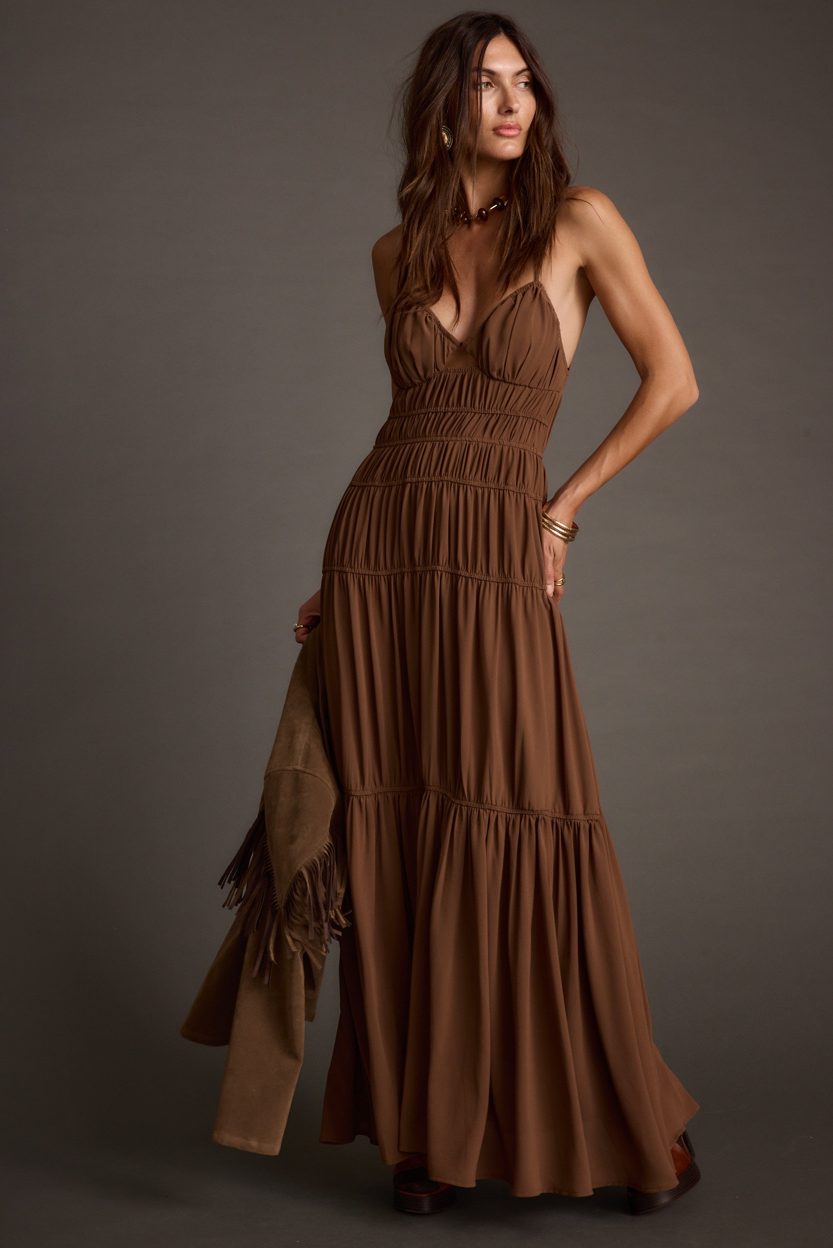 Detail shot of the Adelina Mocha Maxi Dress highlighting the design elements.