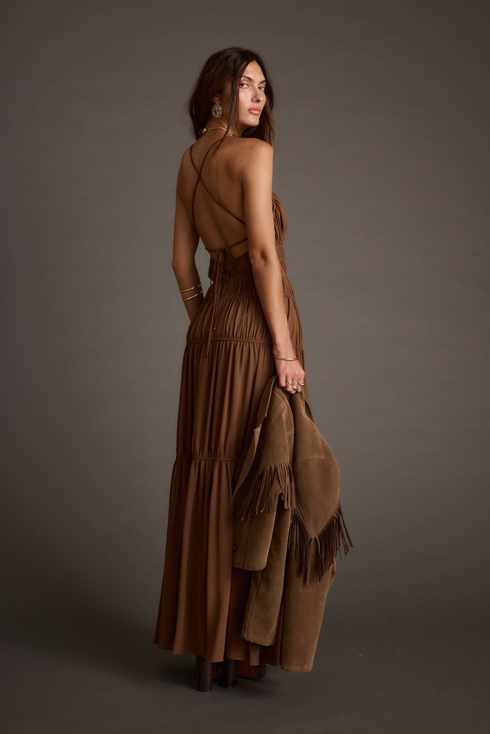 Back view of the mocha maxi dress showing the silhouette and fit.