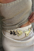 Gold belt with elegant accents, a statement belt essential.