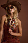 Mocha piece with refined detailing and a flattering silhouette.