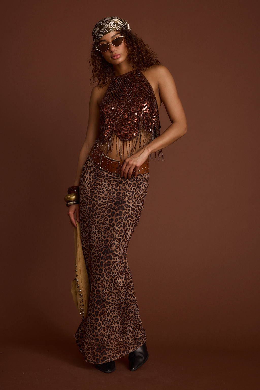 Lifestyle shot of the olive piece styled for day-to-night versatility.