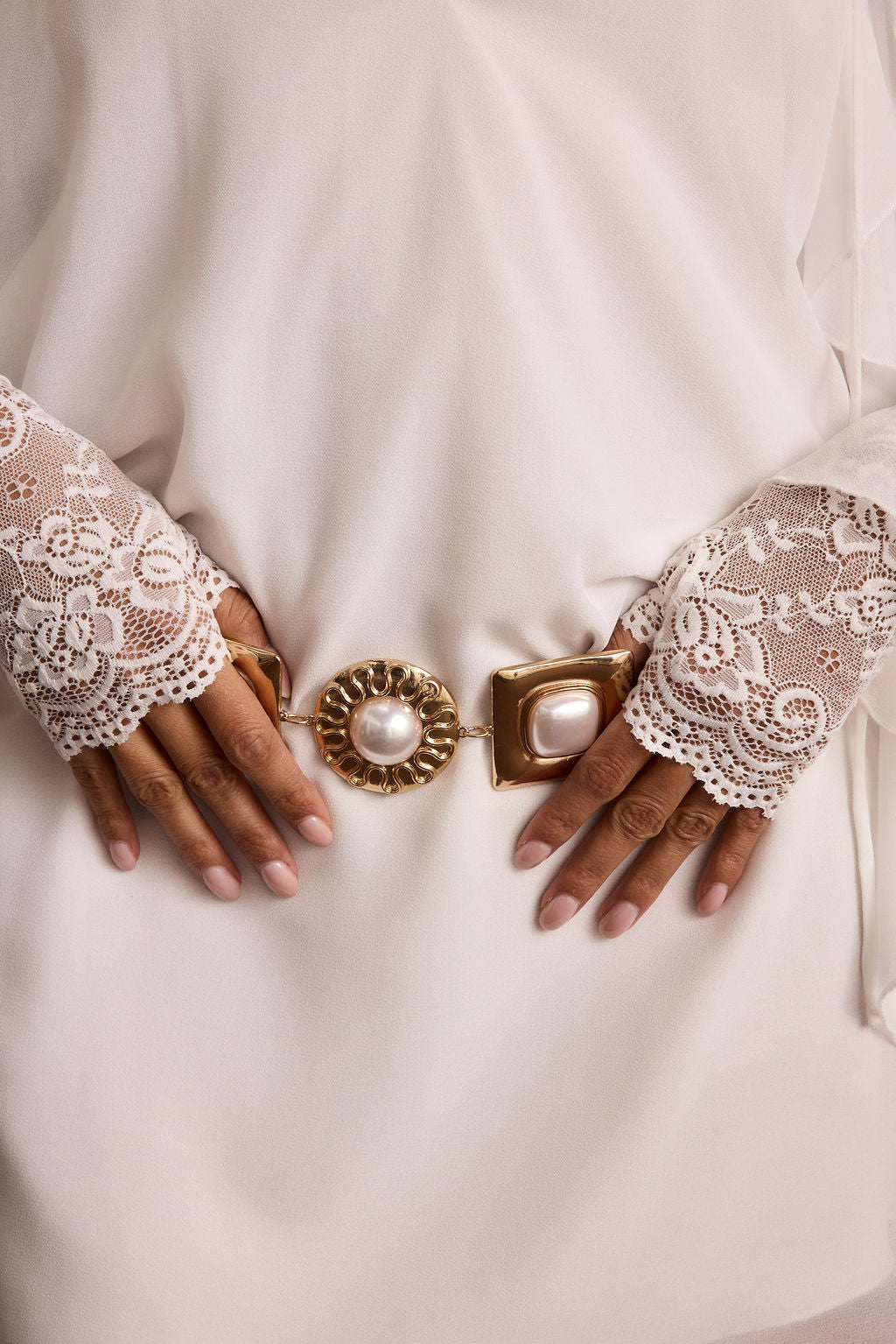 Bells White Lace Bridal Gloves paired with complementary accessories for a polished look.