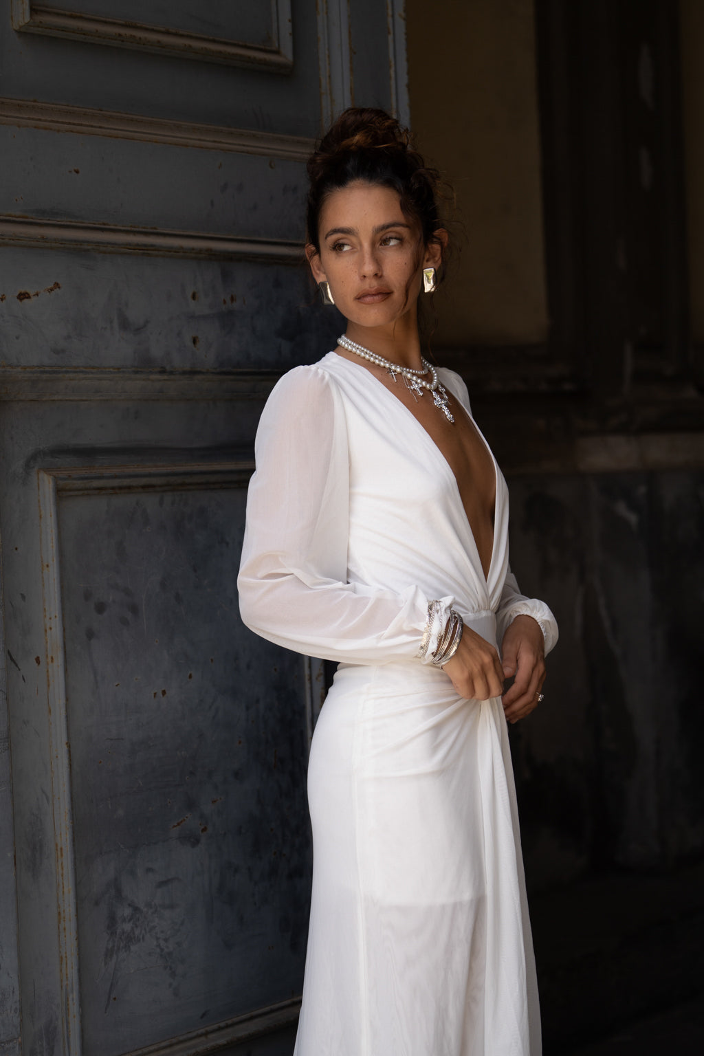 Detail shot of the Bella White Mesh Plunge Maxi Dress highlighting the mesh elements.