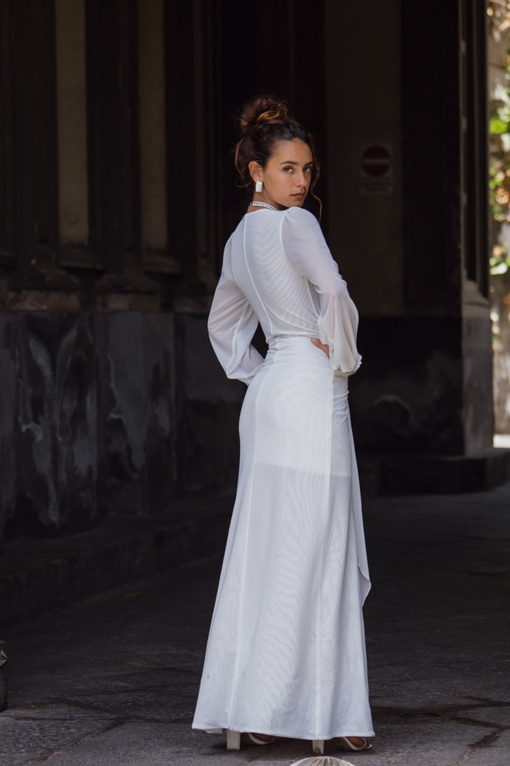 Close-up of the Bella White Mesh Plunge Maxi Dress showcasing the mesh texture and craftsmanship.