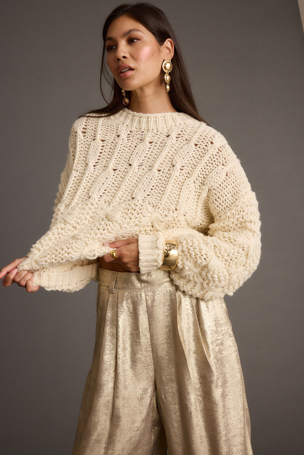 Bethany Cream Cable Knit Sweater paired with complementary accessories for a polished look.