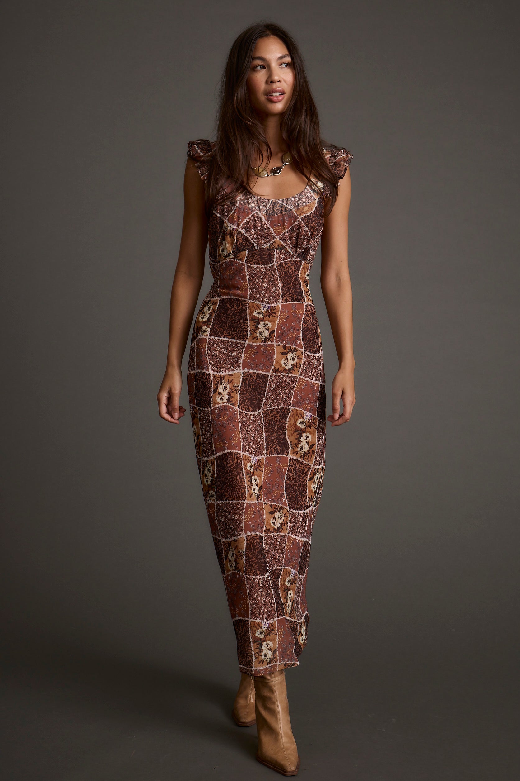 Midi dress with refined detailing and a flattering silhouette.