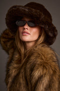 Espresso faux fur hat with refined accents, a black fur hat essential.