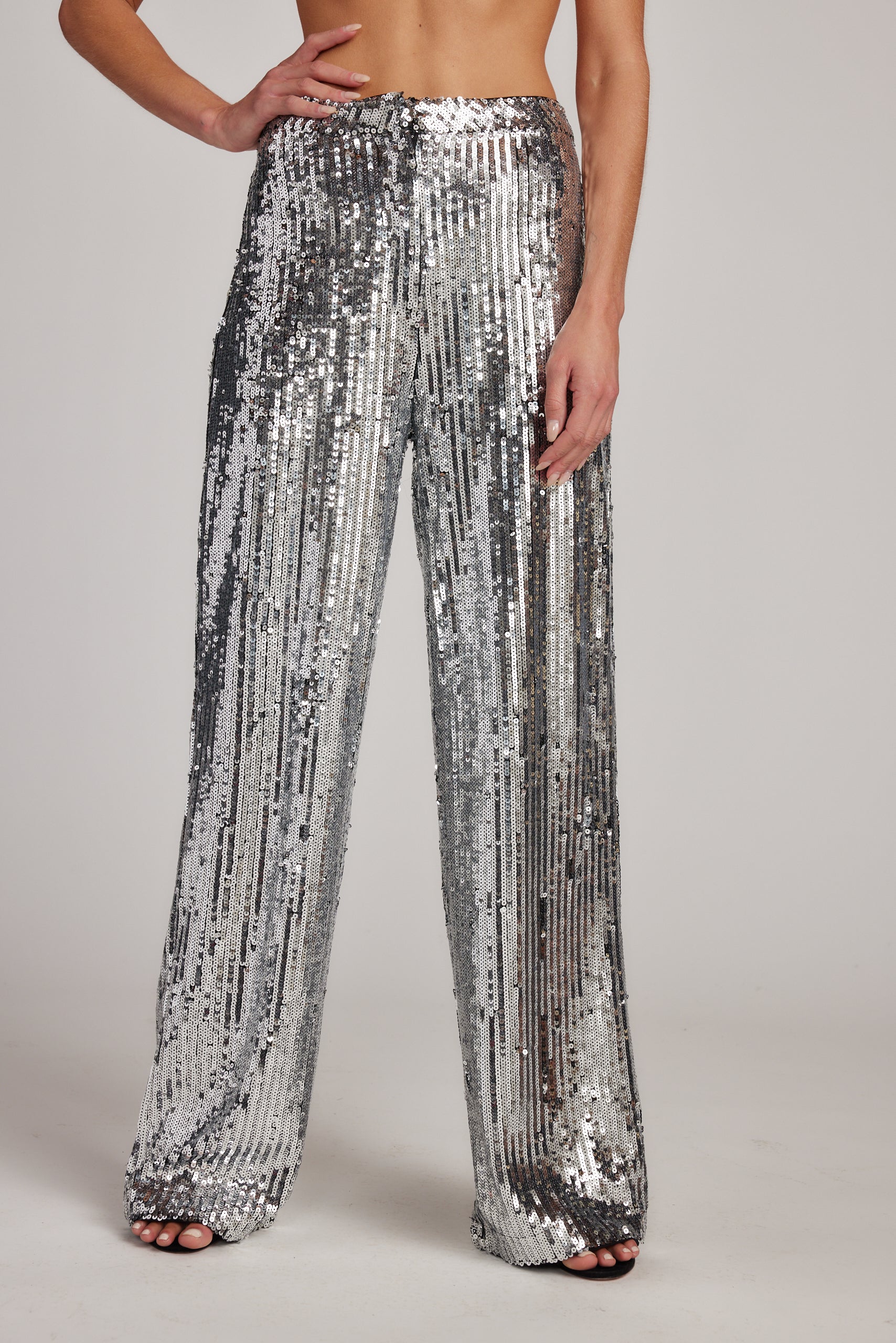 California Dreaming Silver Sequin Trousers shown in a complementary styling arrangement.