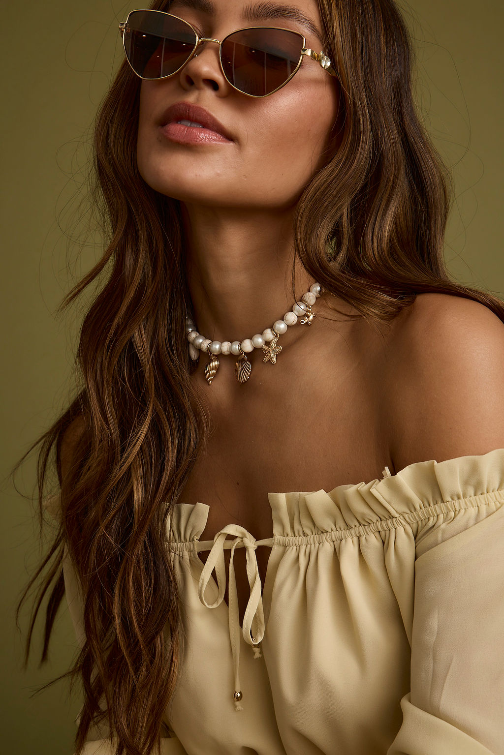 Close-up of the Cove Shell Choker Necklace showcasing the metalwork and pendant detail.
