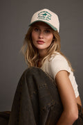 Hat with elegant accents, a cowboy country club hat essential.