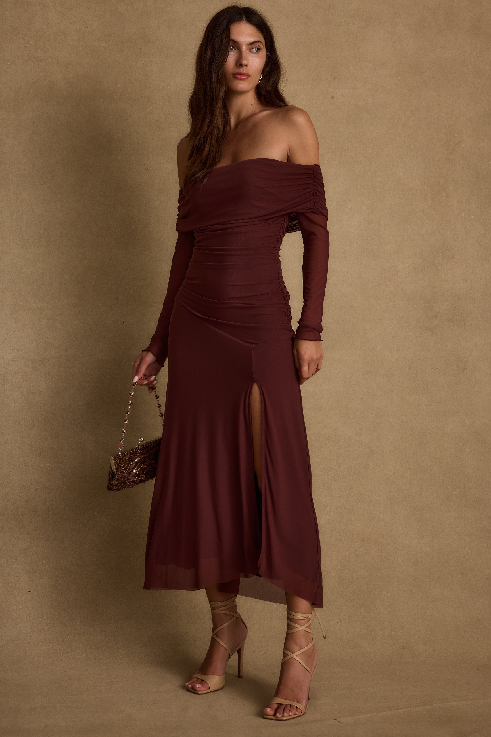 Lifestyle shot of the maxi dress styled for day-to-night versatility.