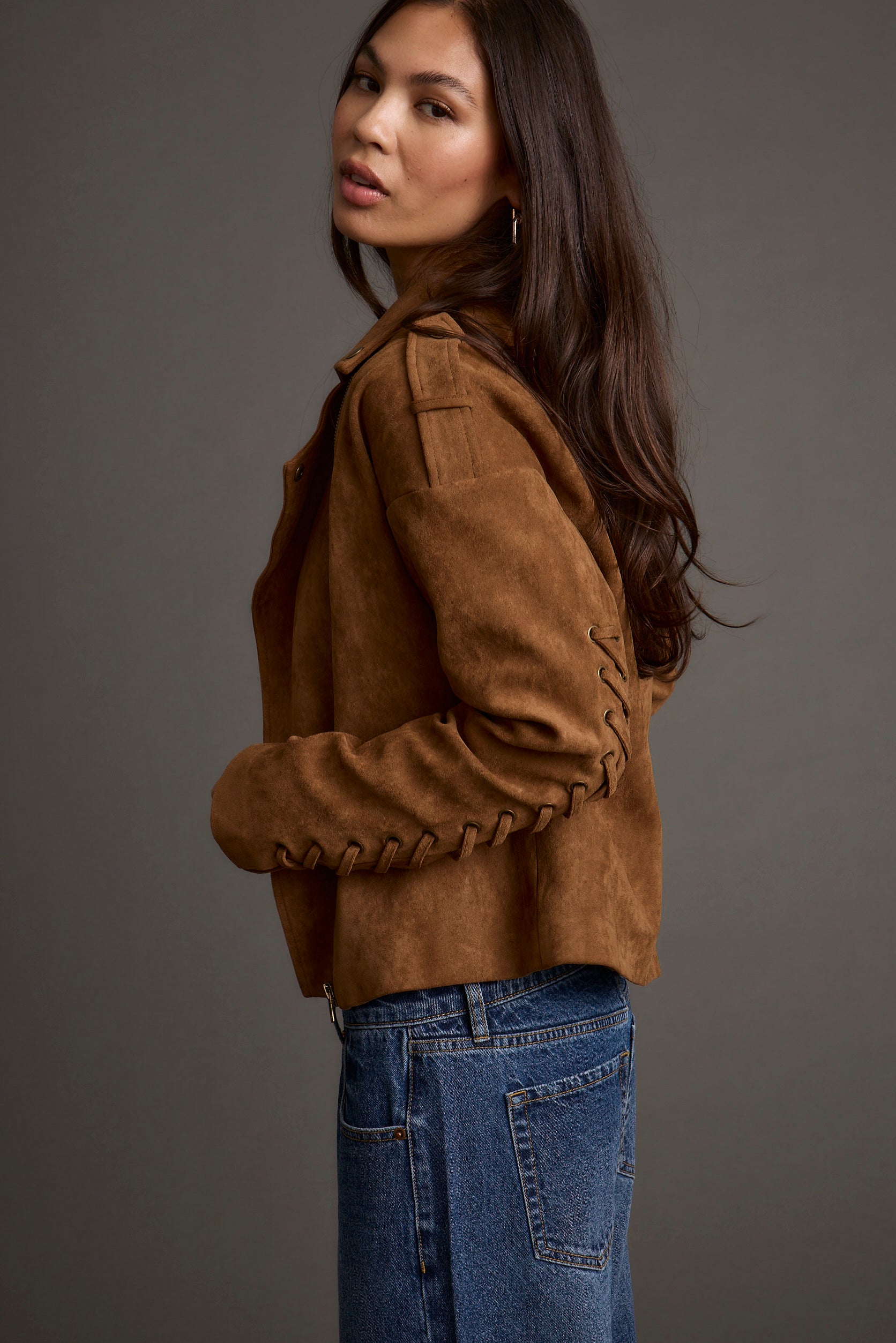 Product view of the Camden Cognac Vegan Suede Jacket showcasing versatility and wearability.
