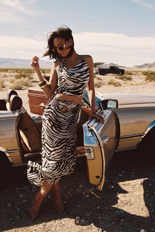 Zebra print maxi skirt with elegant accents, a lace maxi skirt essential.