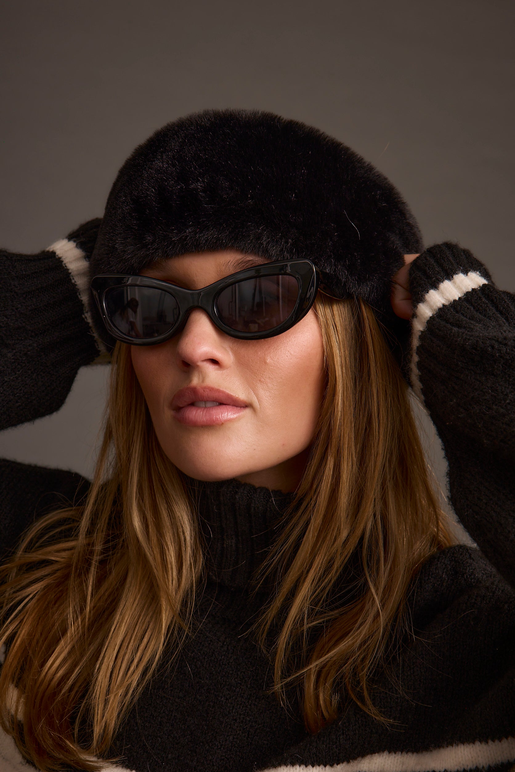Detail shot of the Chalet Black Faux Fur Headband highlighting the faux fur elements.