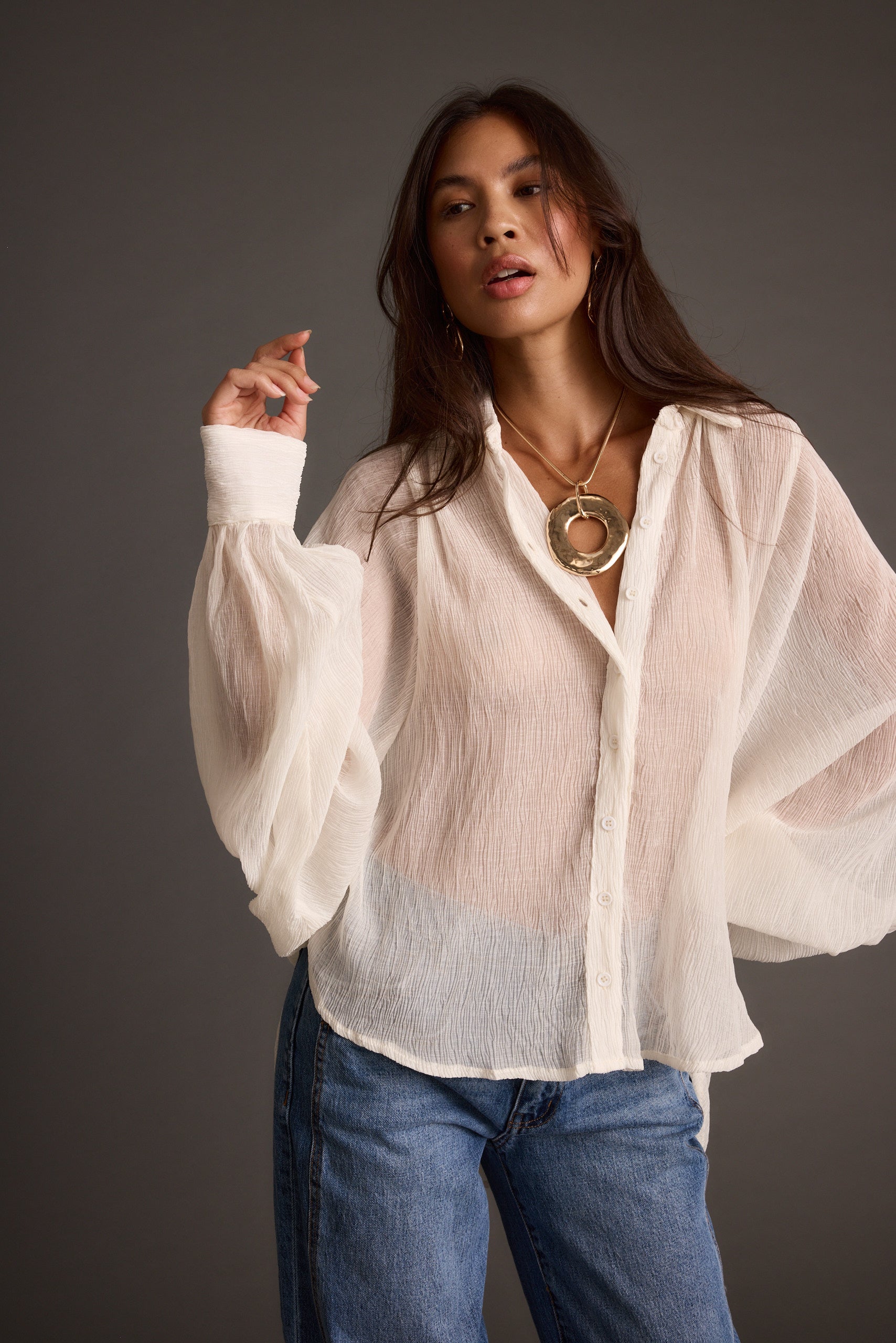 Detail shot of the Claudia Ivory Oversized Blouse highlighting the oversized elements.