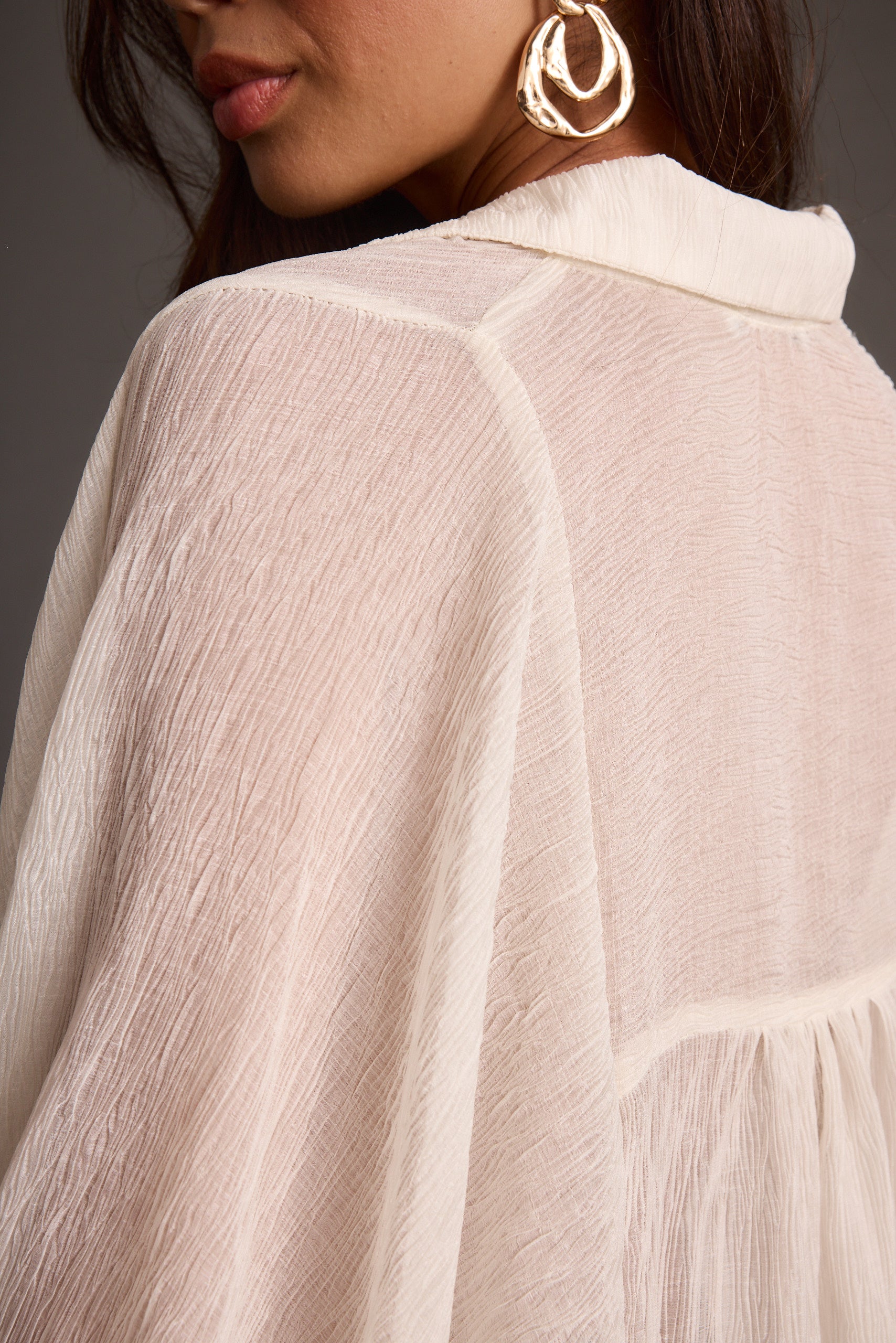 Product view of the Claudia Ivory Oversized Blouse showcasing versatility and wearability.