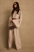 Striped chiffon pants with refined detailing and a flattering silhouette.