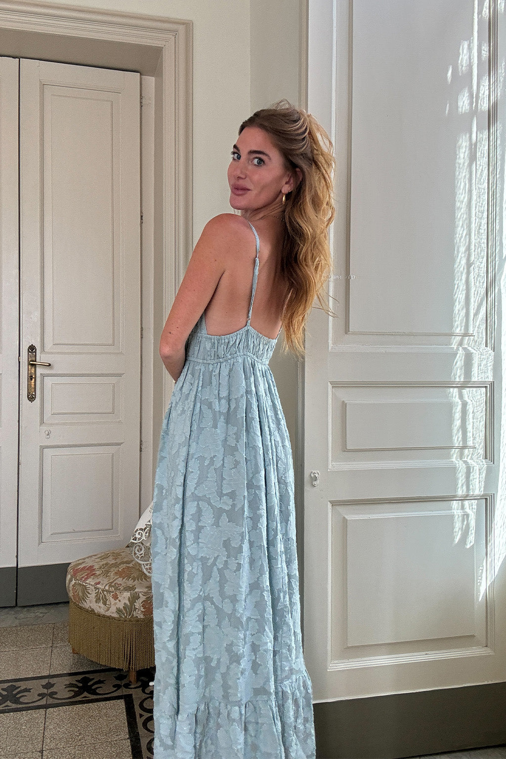 Clemente Blue Textured Maxi Dress styled in a complete look from an alternate angle.