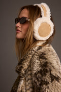 Ivory crystal and faux fur hat with refined detailing and a flattering silhouette.