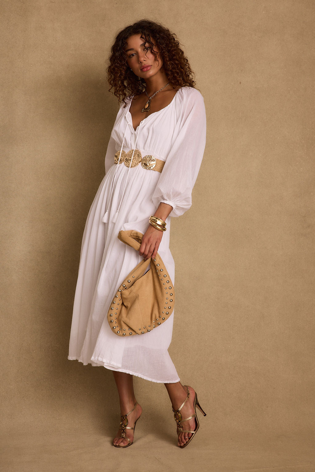 Detail shot of the Danika White Linen Maxi Dress highlighting the linen elements.