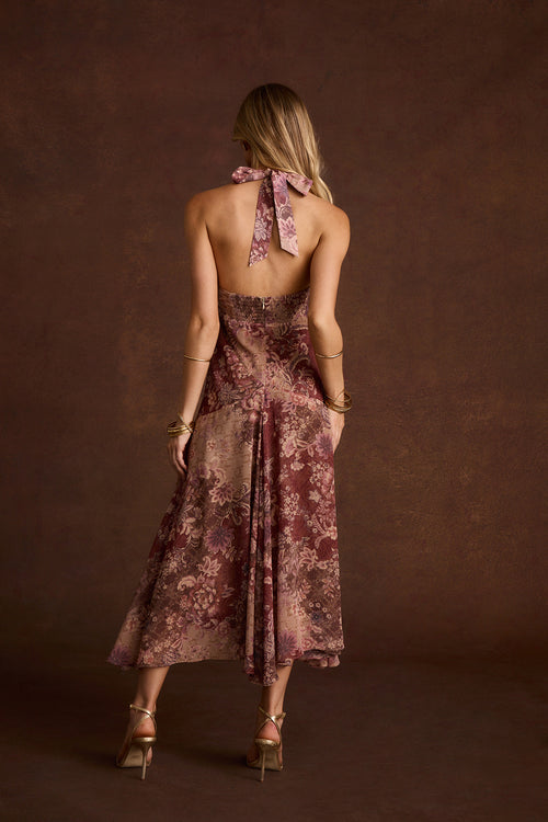 Back view of Darcy berry floral chiffon halter maxi dress with tie neck.