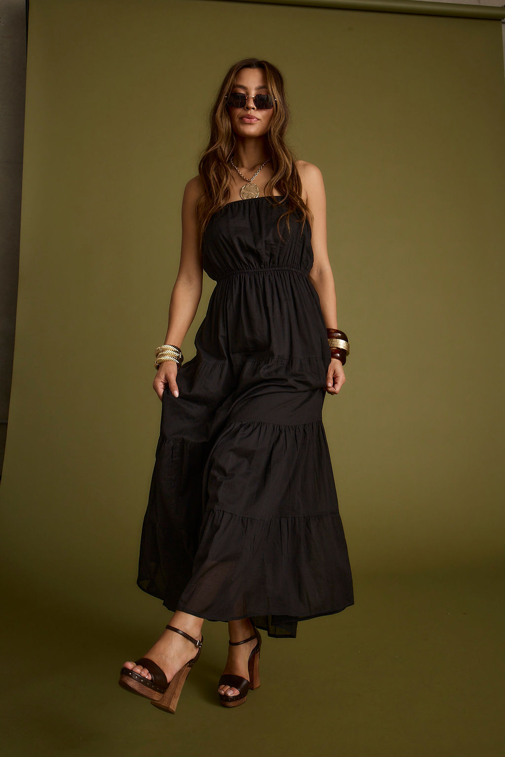 Detail shot of the Darion Black Maxi Dress highlighting the design elements.