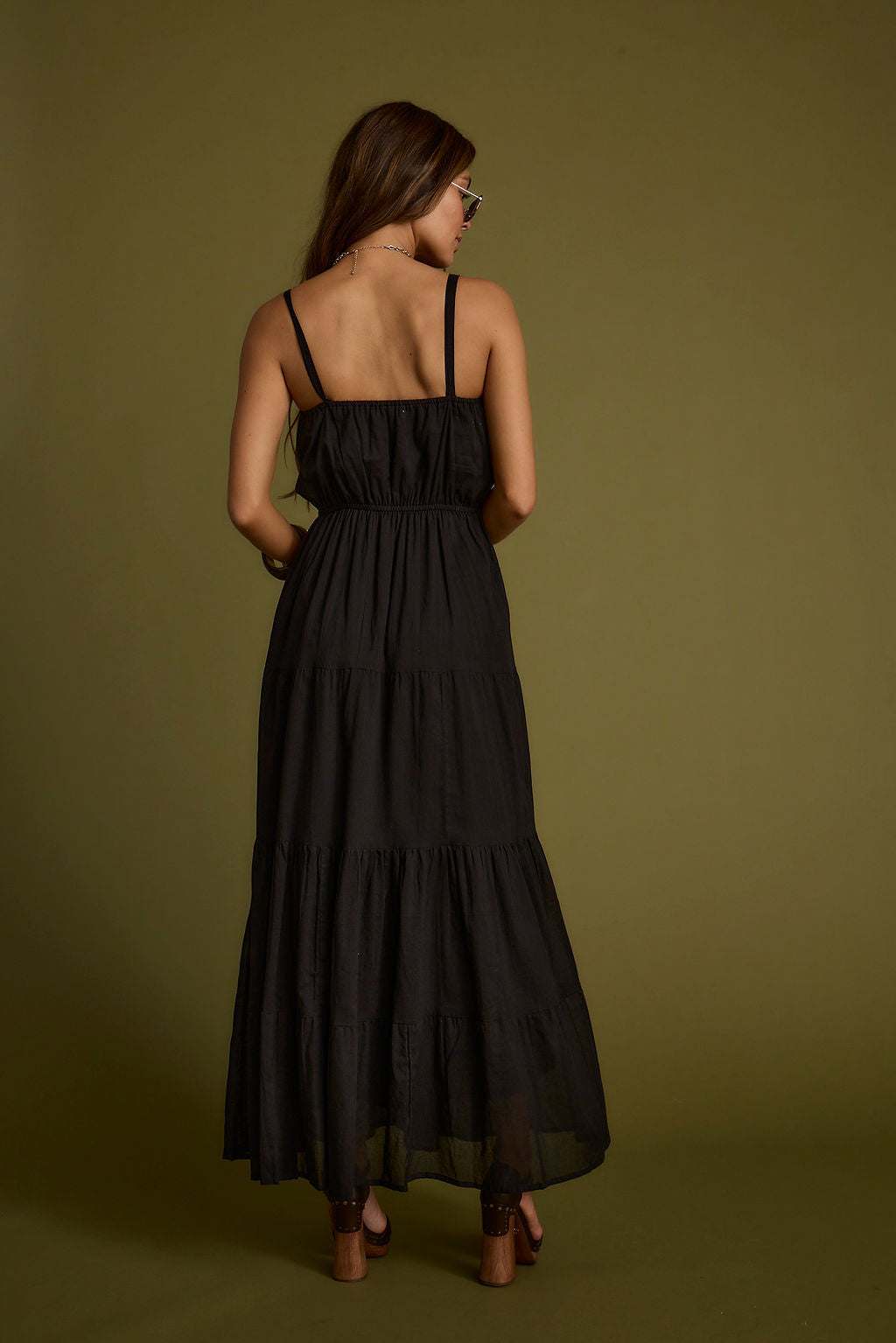 Darion Black Maxi Dress paired with complementary accessories for a polished look.