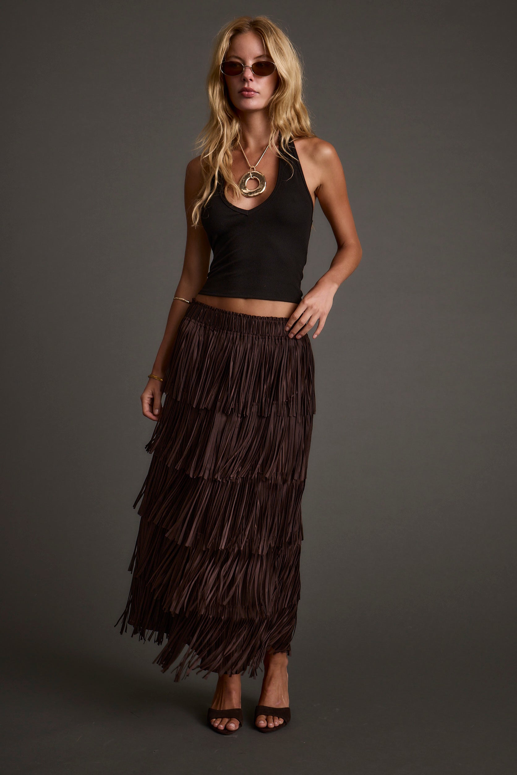 Eliza Espresso Fringe Maxi Skirt paired with complementary accessories for a polished look.