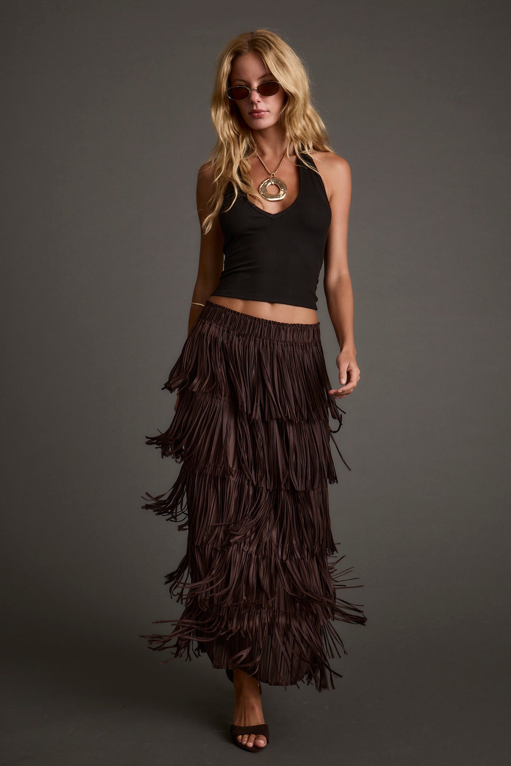 Eliza Espresso Fringe Maxi Skirt styled in a complete look from an alternate angle.