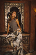 Model wearing the Clear Breeze Marble Satin Pants, a best-selling style in a new colorway, crafted in luxe satin with light gold glitter details throughout, perfect for elevating everyday outfits, resort wear, festival fits, and evening looks