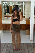 Olive fringe skirt with refined accents, a fringe skirt essential.