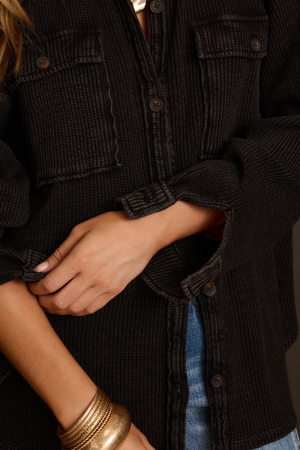 Fall layering piece in washed black, three-quarter view showing chest pocket detail