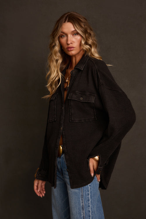 Women's shacket full body front view showing oversized relaxed fit and button closure