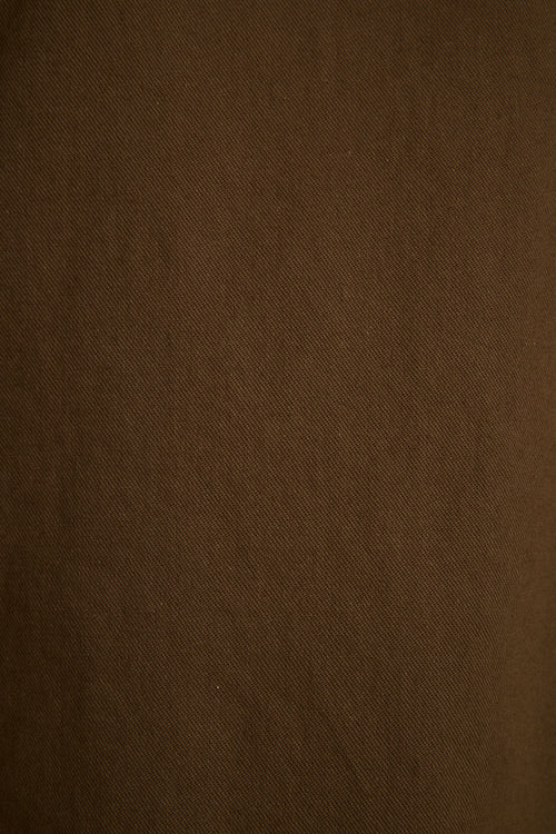 Close-up of the olive canvas twill weave on the Fairfax utility jacket.