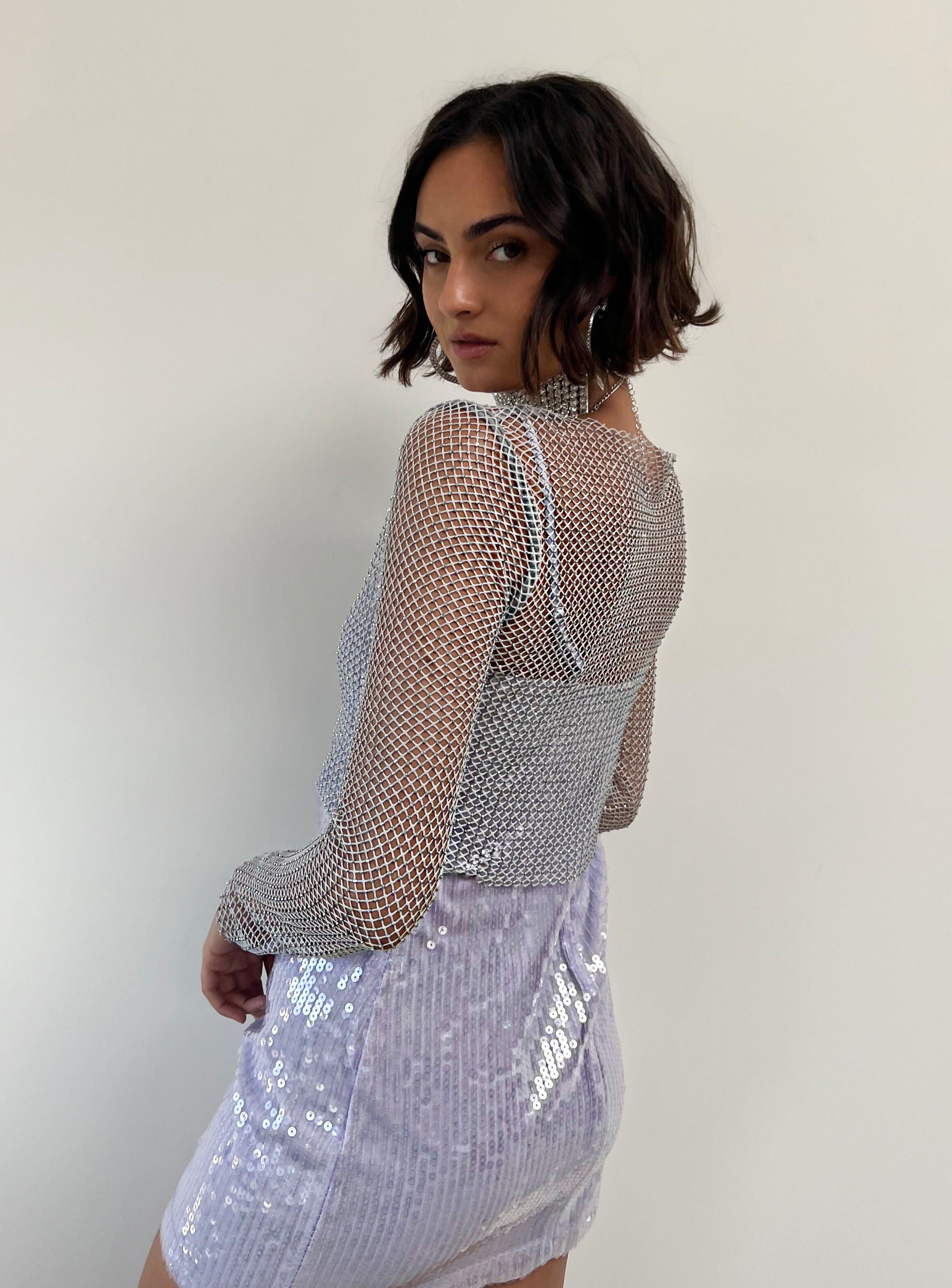 Hands Off Silver Rhinestone Top paired with complementary accessories for a polished look.