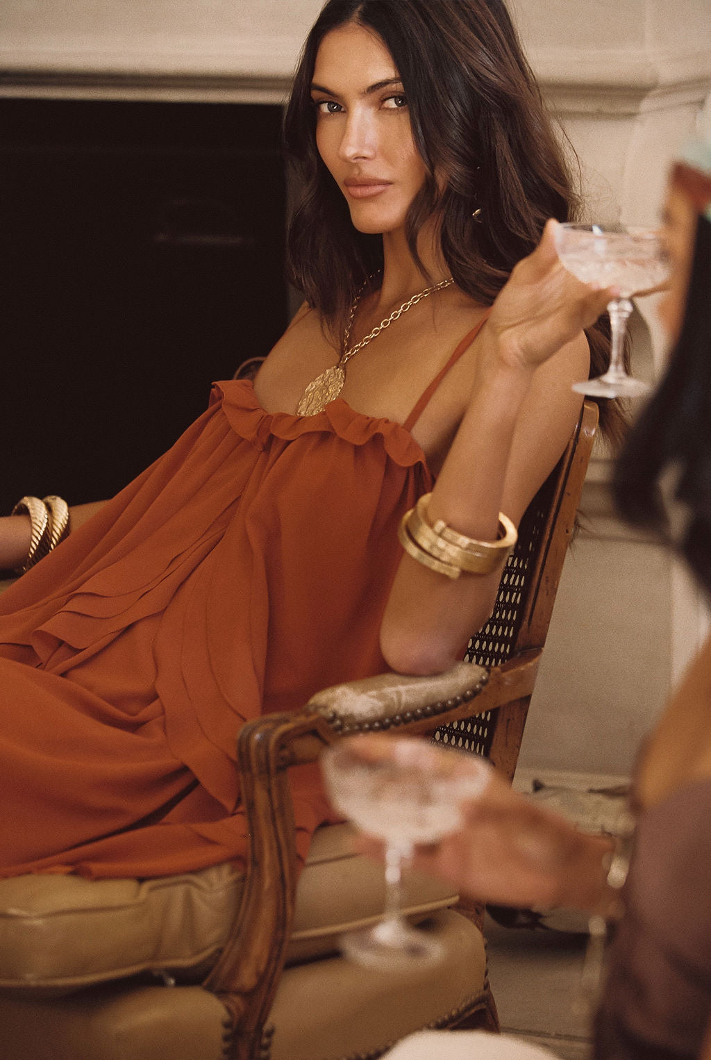 Detail shot of the Forevermore Gold Metal Bangle highlighting the design elements.