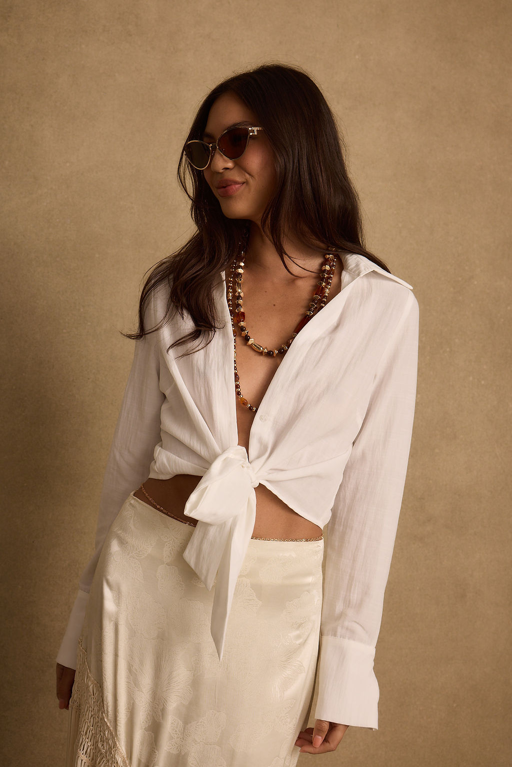 Detail shot of the Adriana White Tie Front Top highlighting the design elements.