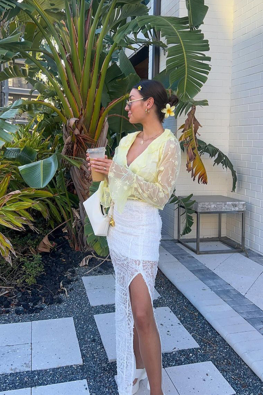 Guilliana Yellow Ruffle Blouse paired with complementary accessories for a polished look.