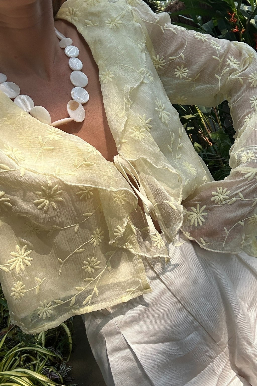 Additional view of the Guilliana Yellow Ruffle Blouse from a different perspective.