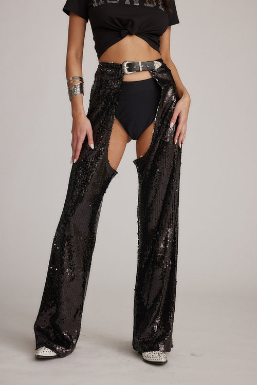 Black sequin pants with refined accents, a rhinestone chaps standout.