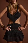 Black fringe cutout mini dress with refined accents, a fringe dress essential.