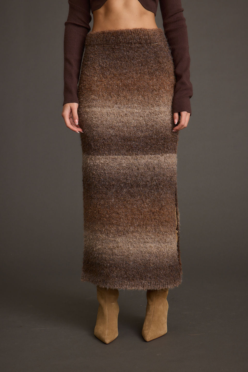 Lifestyle shot of the sweater styled for day-to-night versatility.