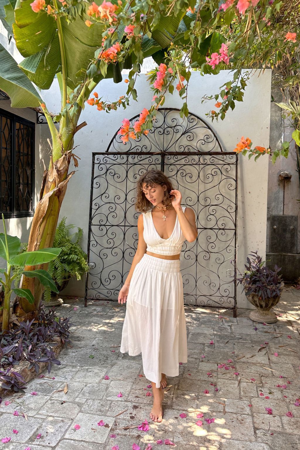 White maxi skirt with elegant accents, a white lace skirt essential.